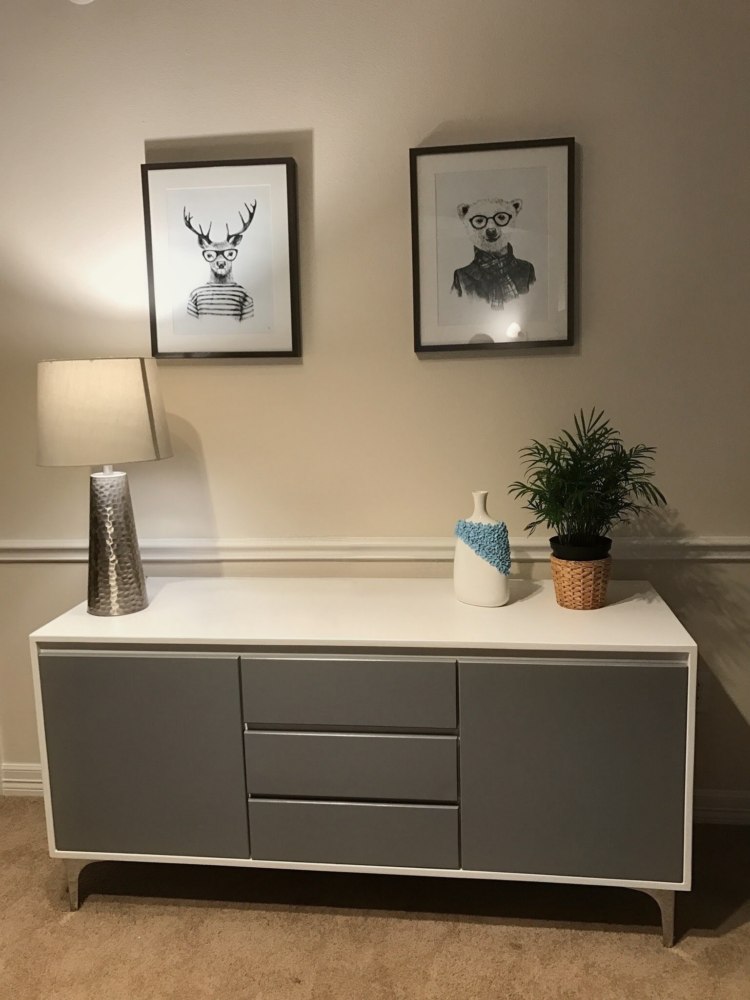 Two-tone painted sideboard on slim metal legs